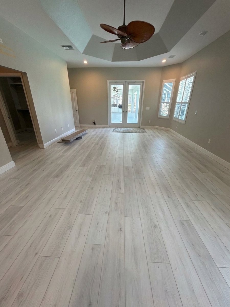 Living room after: luxury vinyl plank installed